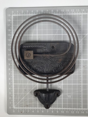 Antique clock cast iron coiled - clock,